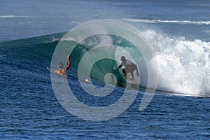 Surfer in the Tube of a Wave