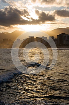 Surfer under Sunset