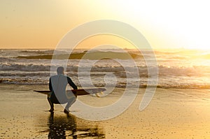 Surfer watching the waves