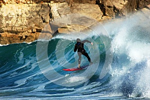 Surfer on wave