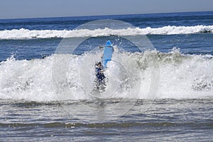 Surfer wiped out by wave