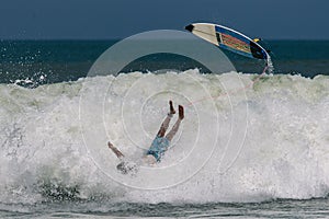 Surfera`s crasha on the wave