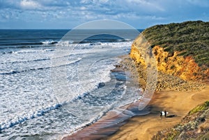 Surfers at Bells Beach, Great Ocean Road, Victoria, Australia