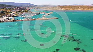 Surfers doing windsurfing at Turkey's world famous Cesme Alacati Beach