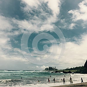 Surfers on Hamoa Beach, Maui. Hawaii