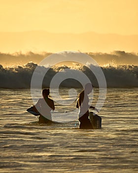 Surfers in Kauai, Hawaii photo