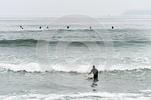 Surfers at Morro Bay