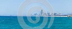 Surfers Paradise skyline in distance along beach