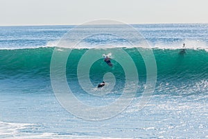 Surfers Surfboards Escape Push Under Ocean Wave