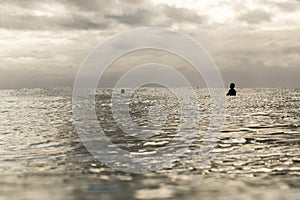 Surfers Waiting