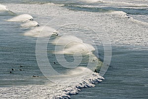 Surfers waiting for wave