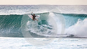 Surfing Banzai Pipeline
