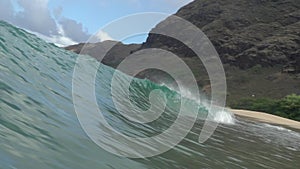 Surfing in the Barrell in Hawaii shorebreak