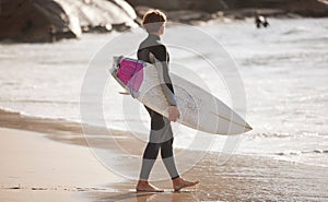 Surfing on beach, man with surfboard for sport outdoor, ocean and travel with mockup space and nature. Adventure