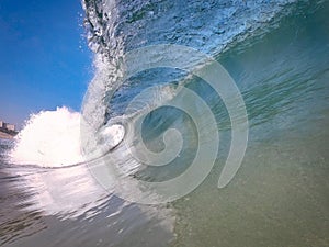 Surfing in the big shorebreak waves