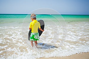 Surfing boy