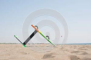 Surfing foil board in sand