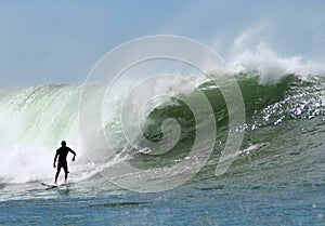 Surfing huge waves in Hawaii