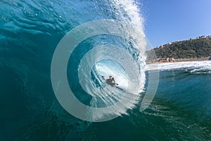 Surfing Inside Blue Ocean Wave