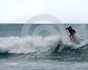 Surfing at Madasari Beach