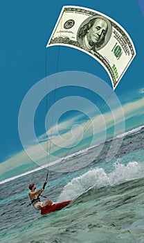 Surfing man & US Dollar as kite, sail,