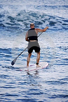 Surfing with Oar photo