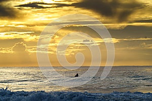 Surfing in the ocean in Umdloti, KZN, South Africa