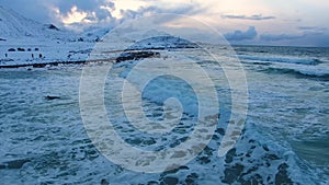 Surfing on Scansanden beach of Lofotens