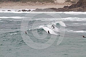 Surfing at Sennen Cove Cornwall