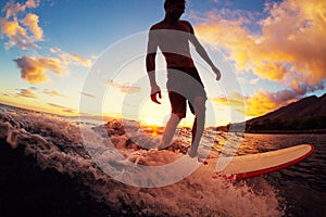 Surfing at Sunset photo