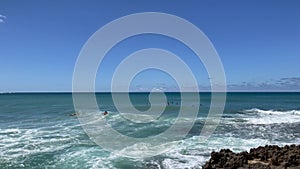 Surfing at the Turtle Bay vista, Oahu, Hawaii