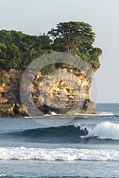 Surfing at Watu Karung, Java, Indonesia