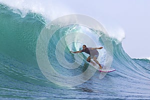 Surfing a Wave. Bali Island. Indonesia.