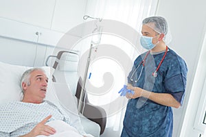 Surgen talking to patient before operation photo