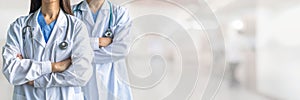 Surgeon and anesthetist doctor ER surgical team with medical clinic room background for emergency nursing care professional team