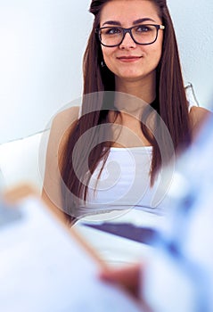 Surgeon and doctor analyzing x-ray together in medical office