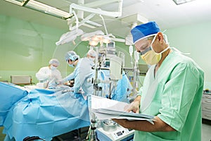 Surgeon doctor in surgery operation room