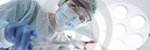 Surgeon female doctor in operating room portrait.