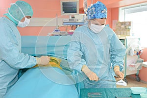 Surgeon getting ready to operate on patient