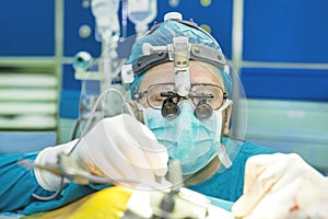 Surgeon with magnification loops