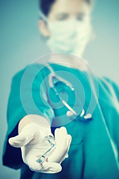 Surgeon medic with scissors photo