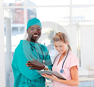 Surgeon and nurse in hospital