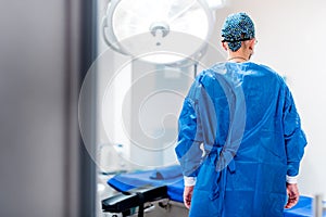 Surgeon in operating room of hospital. Getting ready for surgery