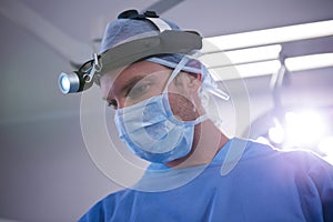 Surgeon performing operation in operation room