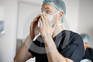 Surgeon prepares for a surgical operation