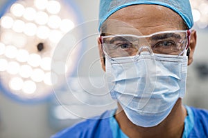 Surgeon with protective mask photo