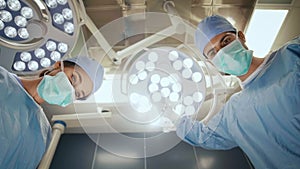 Surgeon setting the surgical light during an operation