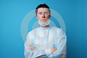 Surgeon in sterile blue uniform
