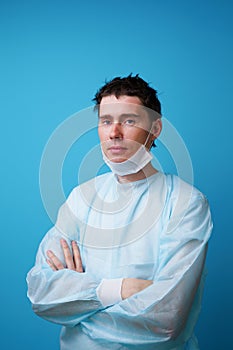 Surgeon in sterile blue uniform