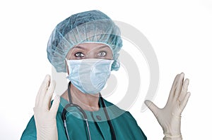 Surgeon with stethoscope wearing surgeon mask